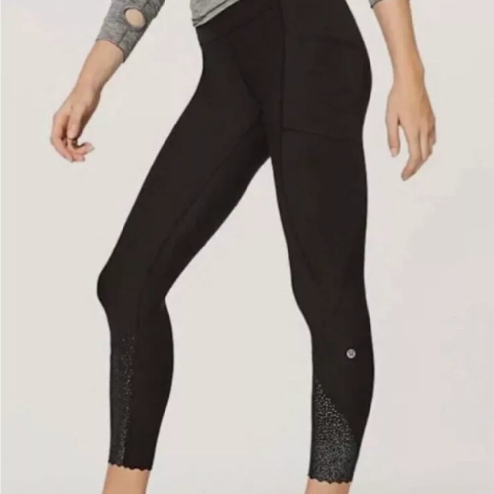 SOLD NWOT Lululemon Tight Stuff Tight Black Size 2 Scalloped Hem Reflective Dots